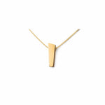 Pendant crafted from 14k gold with a brushed surface