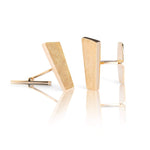 Exclusive cufflinks in gold with a brushed surface inspired by the Pulpit Rock